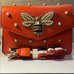 Orange Designer Bag with Gold Bee Accent